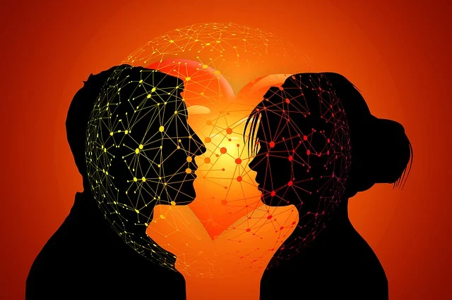 Silhouetted faces facing each other with digital connections between them, set against a heart-shaped background, symbolizing technology-driven connections and love.